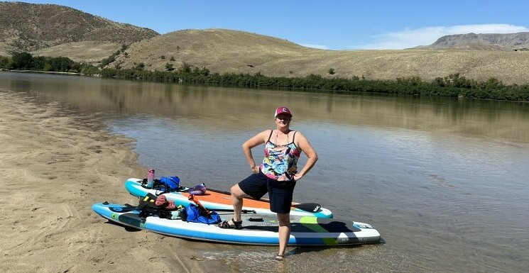 paddle baording a river