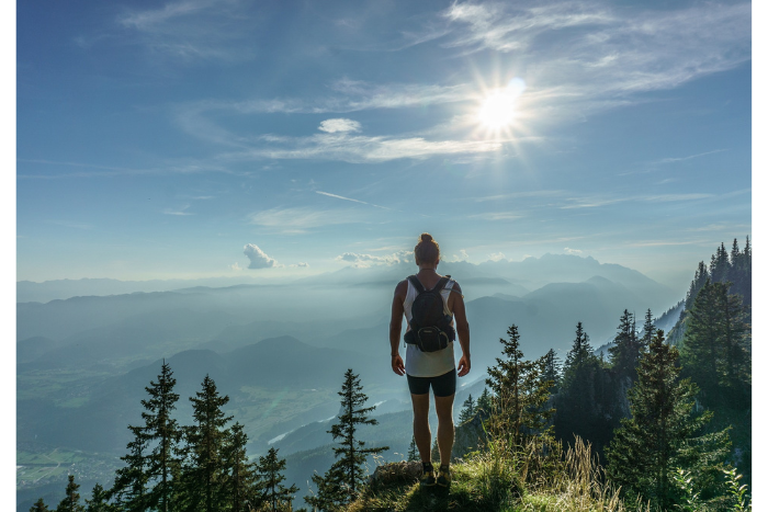 woman hiking overlook valley